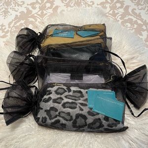 KEYPER Wristlet- solid yellow, clear, animal print (all new), solid black (used)